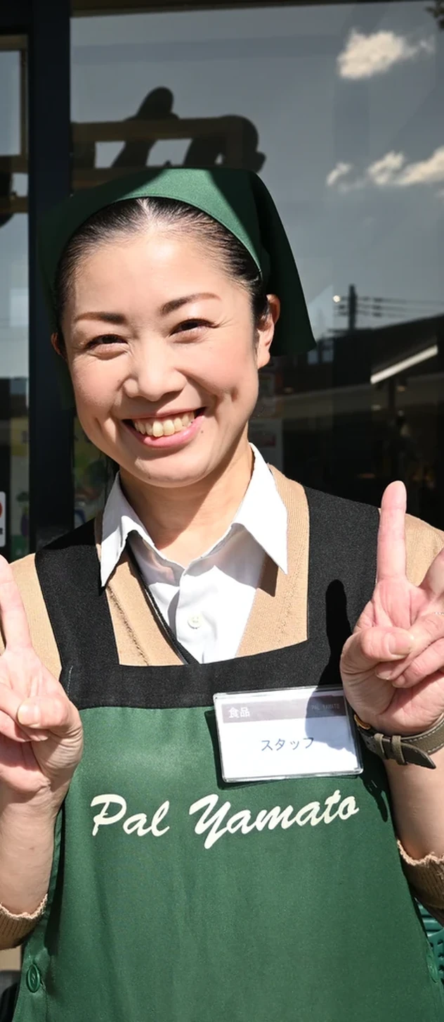 売場のスタッフの笑顔